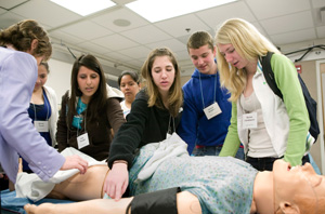 High school students examining brain tissue at Stanford School of Medicine