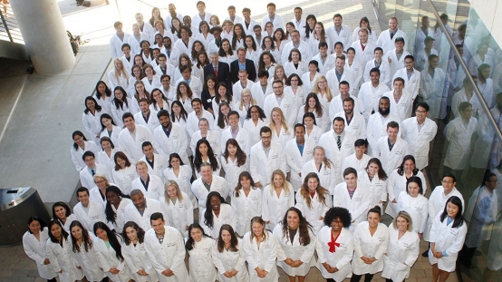 New graduate students in biosciences welcomed with lab coats