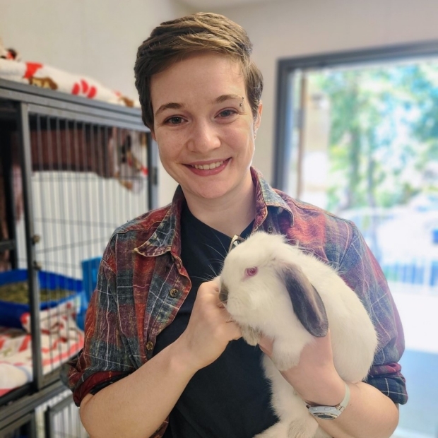 student holding a rabbit