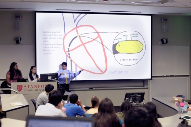 students giving slideshow presentation