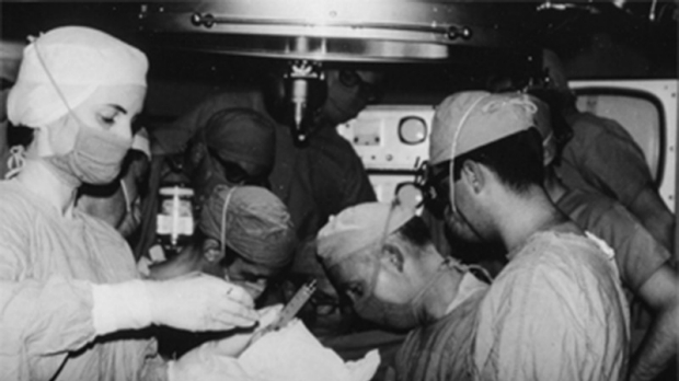 black and white photo of surgeons (including Norman Shumway) performing the first heart transplant in the US