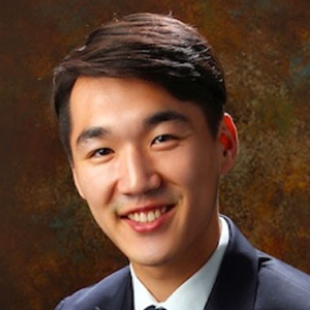 smiling headshot of Perry Choi