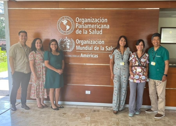 Calvin Lau with colleagues and Ministry of Health officials pictured at Pan American Health Organization office