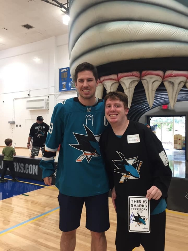 Justin with San Jose Sharks player