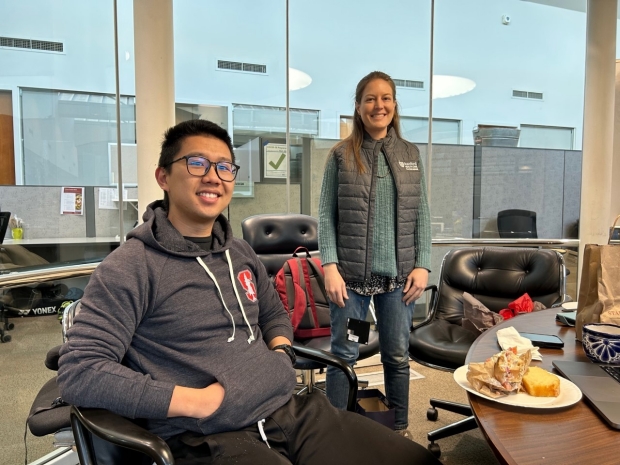 Alumni Melissa Slocumb and Christopher Jin show off their new Stanford swag