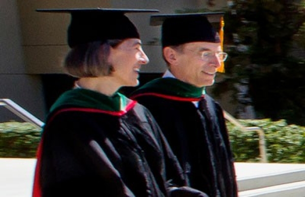 Laurie Weisberg walks into the commencement ceremony.