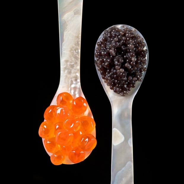 Two spoons filled with caviar