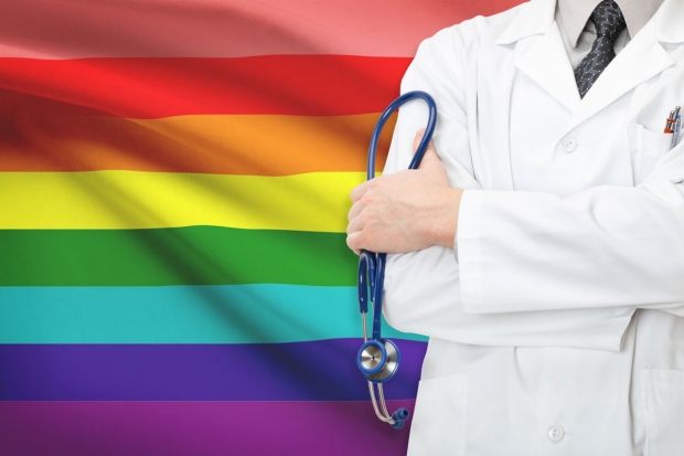 rainbow flag and physician with stethoscope