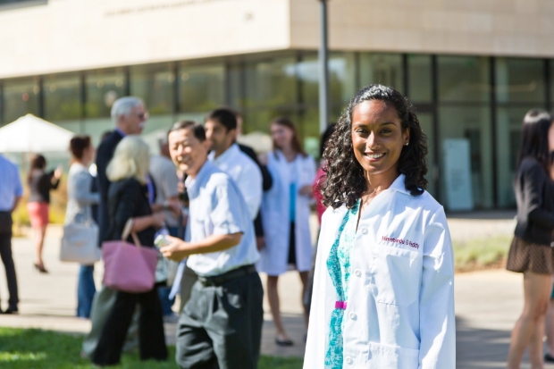 Photo of researcher at White Coat Ceremony