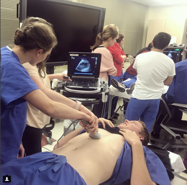 Person performing ultrasound