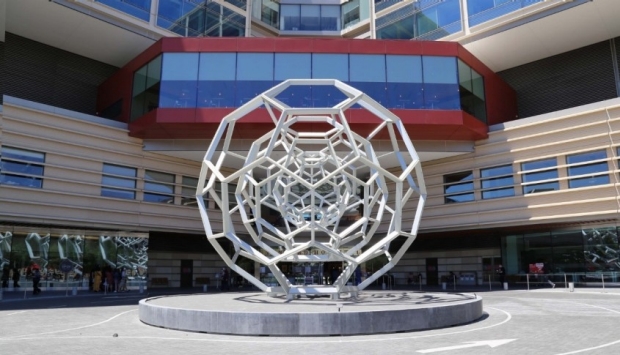 Photo of the front of the new Stanford Hospital showing the "Buckyball"