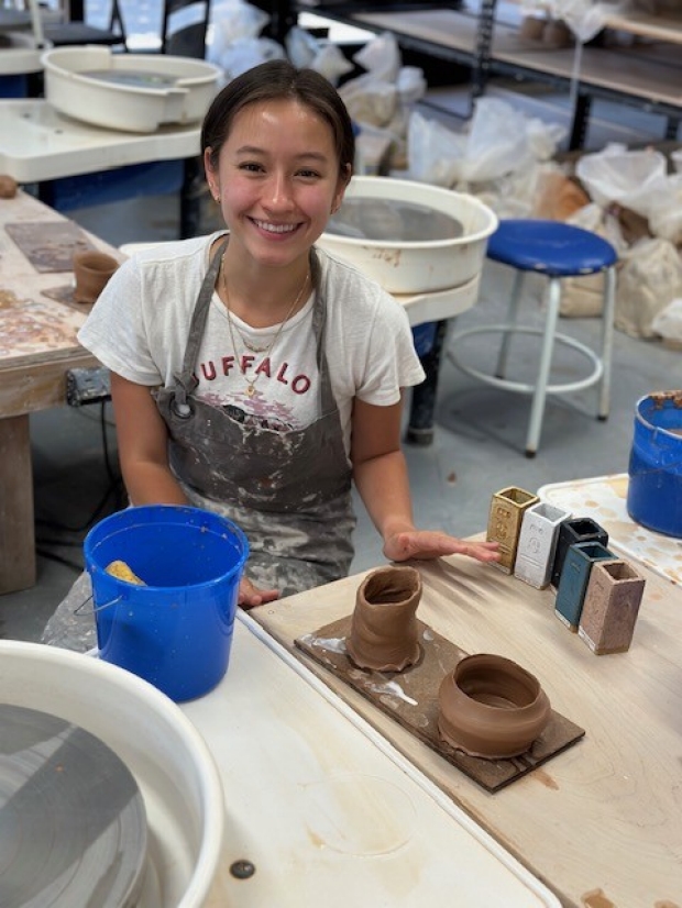 Alena at pottery class lab outing 2023