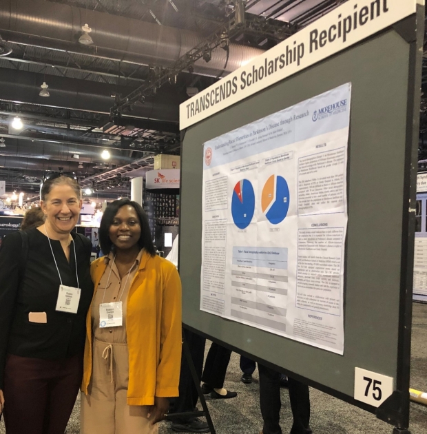 Dr. Kathleen Poston at AAN TRANSCENDS mentee Dr. Chantale Branson’s research presentation at the 2019 AAN