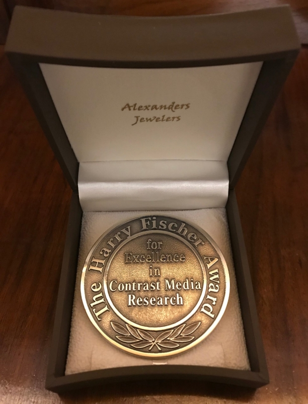 Photo of the Harry Fischer Award medal
