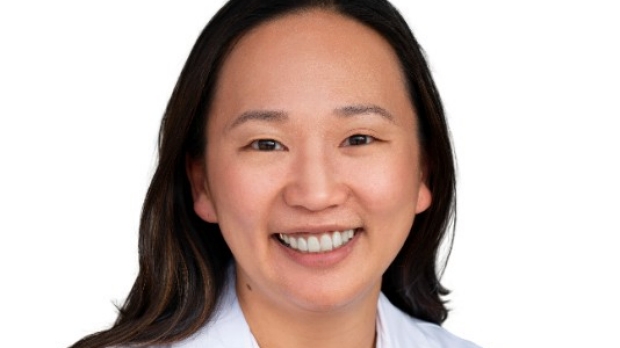 smiling headshot of June Rhee