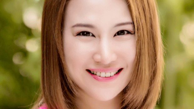 smiling headshot of Mingxia Gu